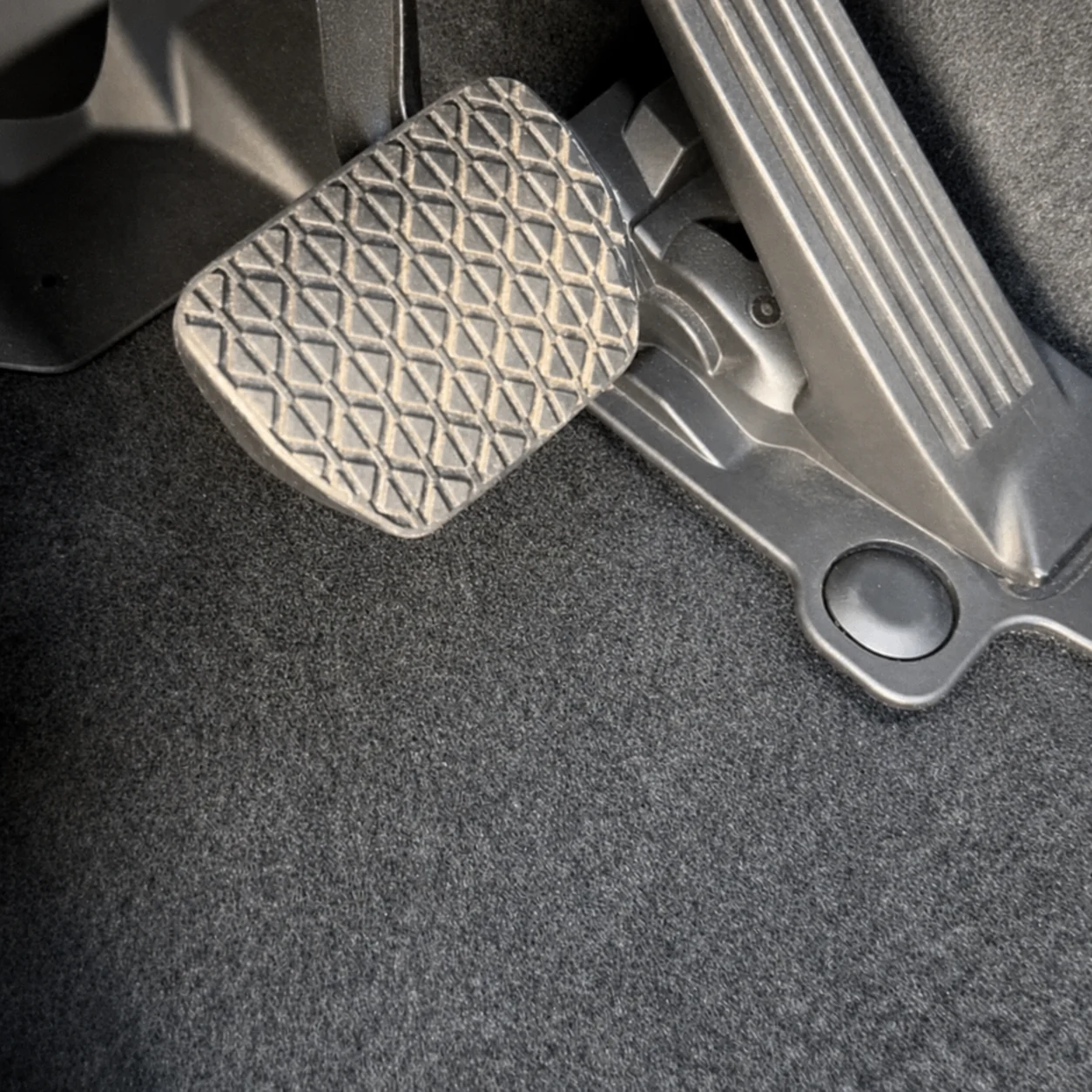 Clean driver footwell after full car detailing in Queens, New York
